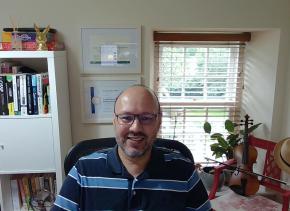 A picture of John in his writing studio