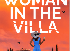 Book cover for The Woman In The Villa, featuring a woman in a blue dress standing by a pool at sunset, holding a glass of wine and looking towards an Italian villa flanked by pine trees
